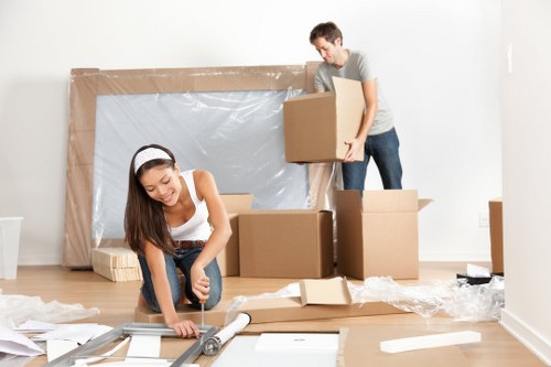 Small removals team loading furniture in Cockfosters