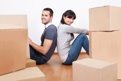 Well-arranged storage unit showing labeled boxes and packed belongings